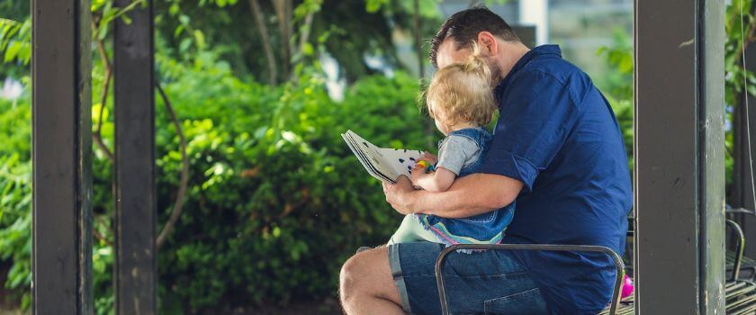 father_and_baby_reading